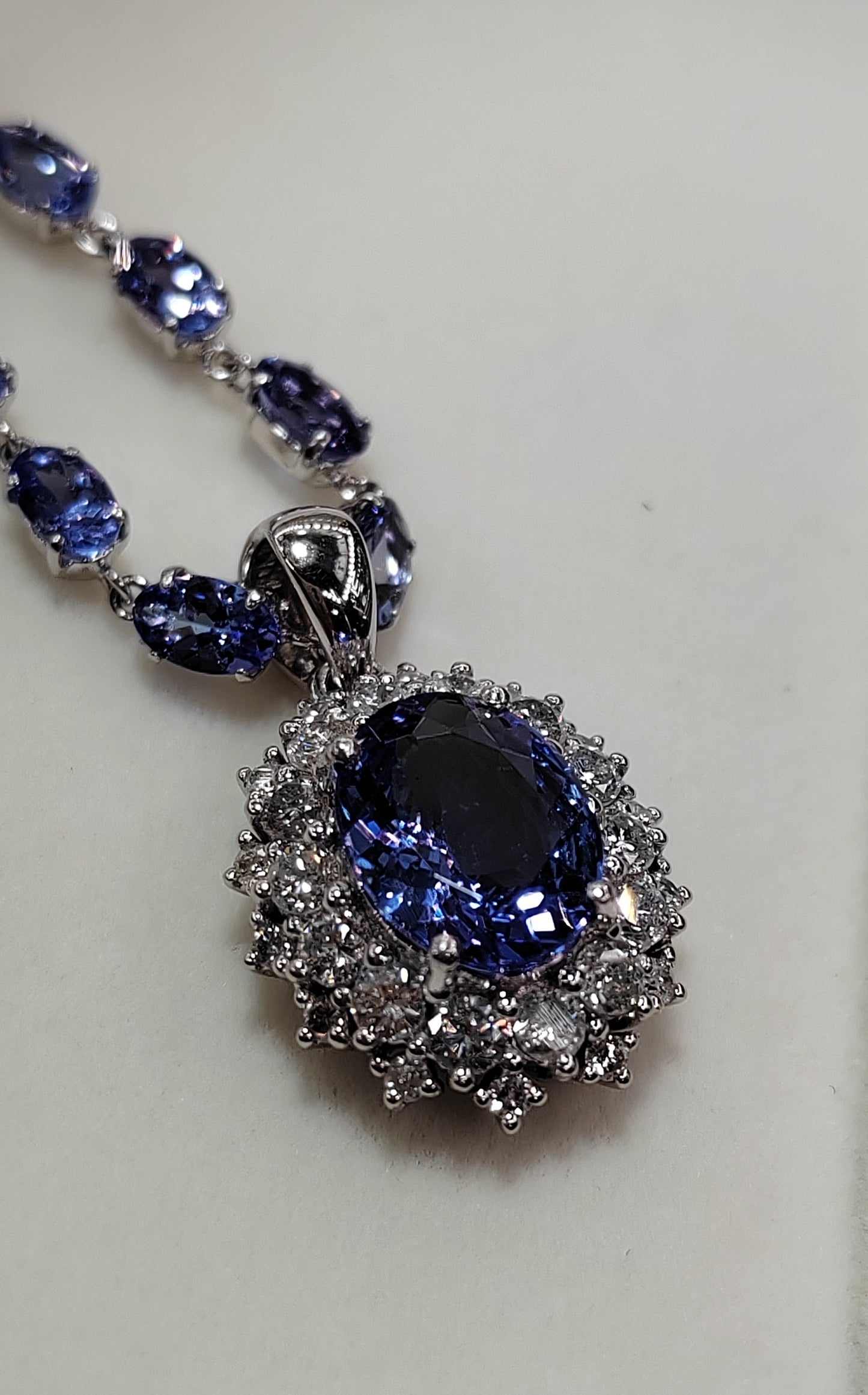 12ct Natural Tanzanite 0.81ct natural brilliant diamonds fine Platinum Pt900 necklace and pendant