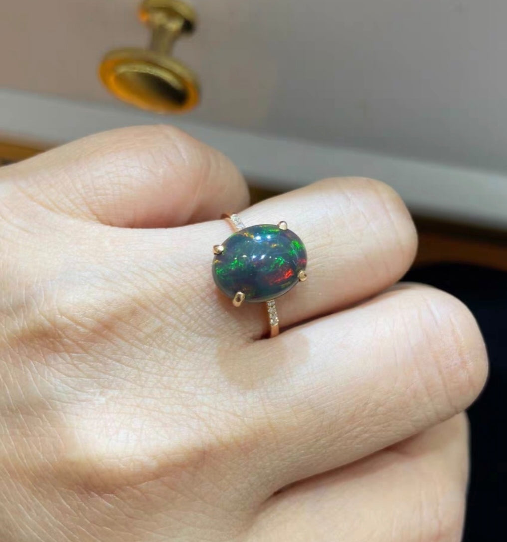 Genuine opal 18ct diamond ring